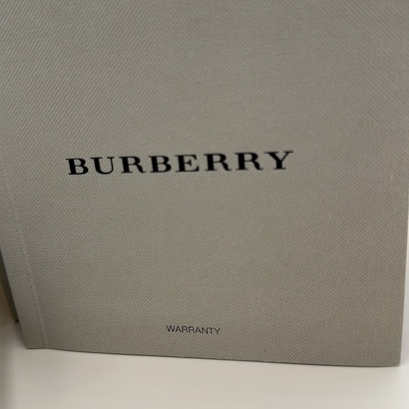 Vintage Burberry ladies watch. EUC box and original paperwork. Stainless band